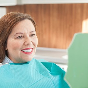 Woman smiling in the dental chair