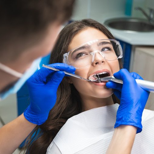 Patient opening her mouth wide for her cleaning